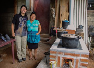 Jimena with stove recipient in Guatemala