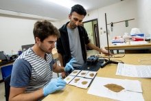 Faculty member teaching in lab