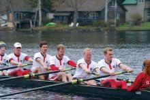 A photo of the men's rowing team in action.